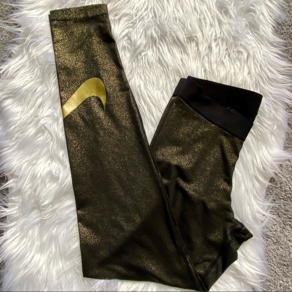 Black and gold Nike Pro sports leggings